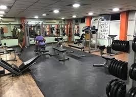 Flex Gym member training on cable machine